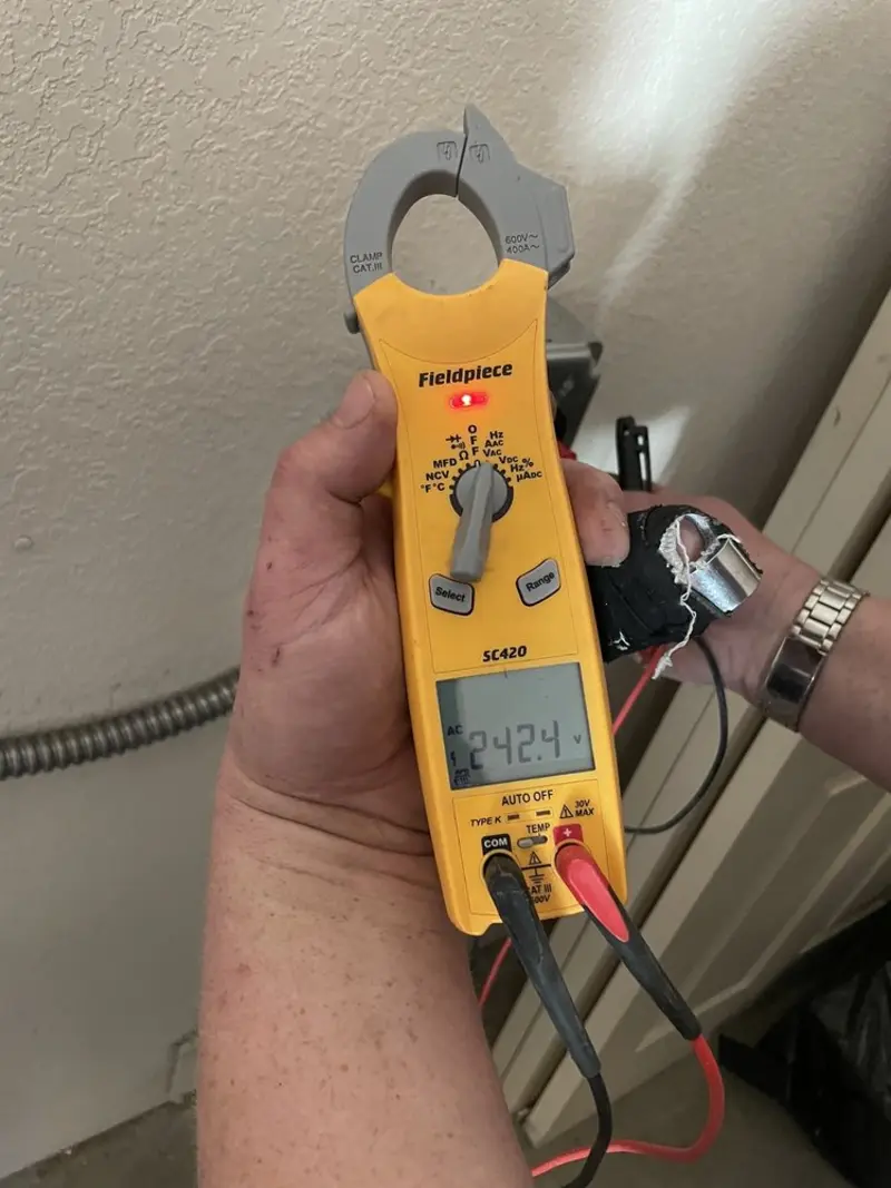 Voltage testing with clamp meter during Circuit Breaker Repair in Gloucester Point